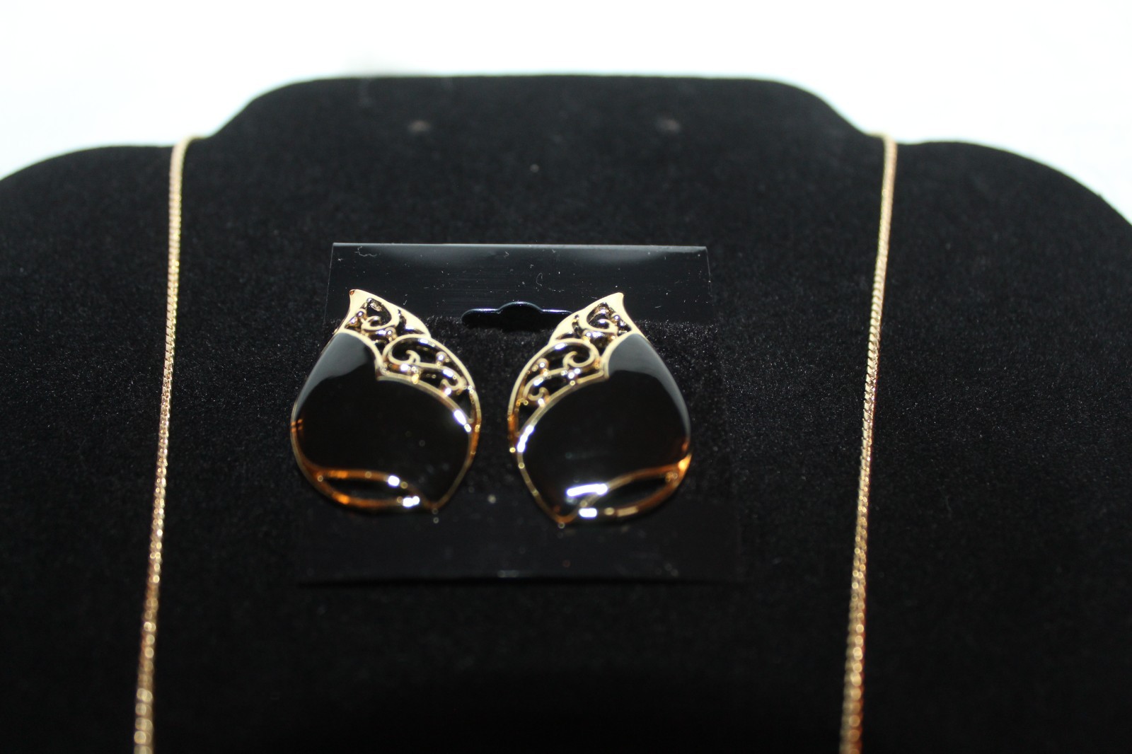 Filligree style necklace 17in and earrings. Gold plated with black emerald inlay