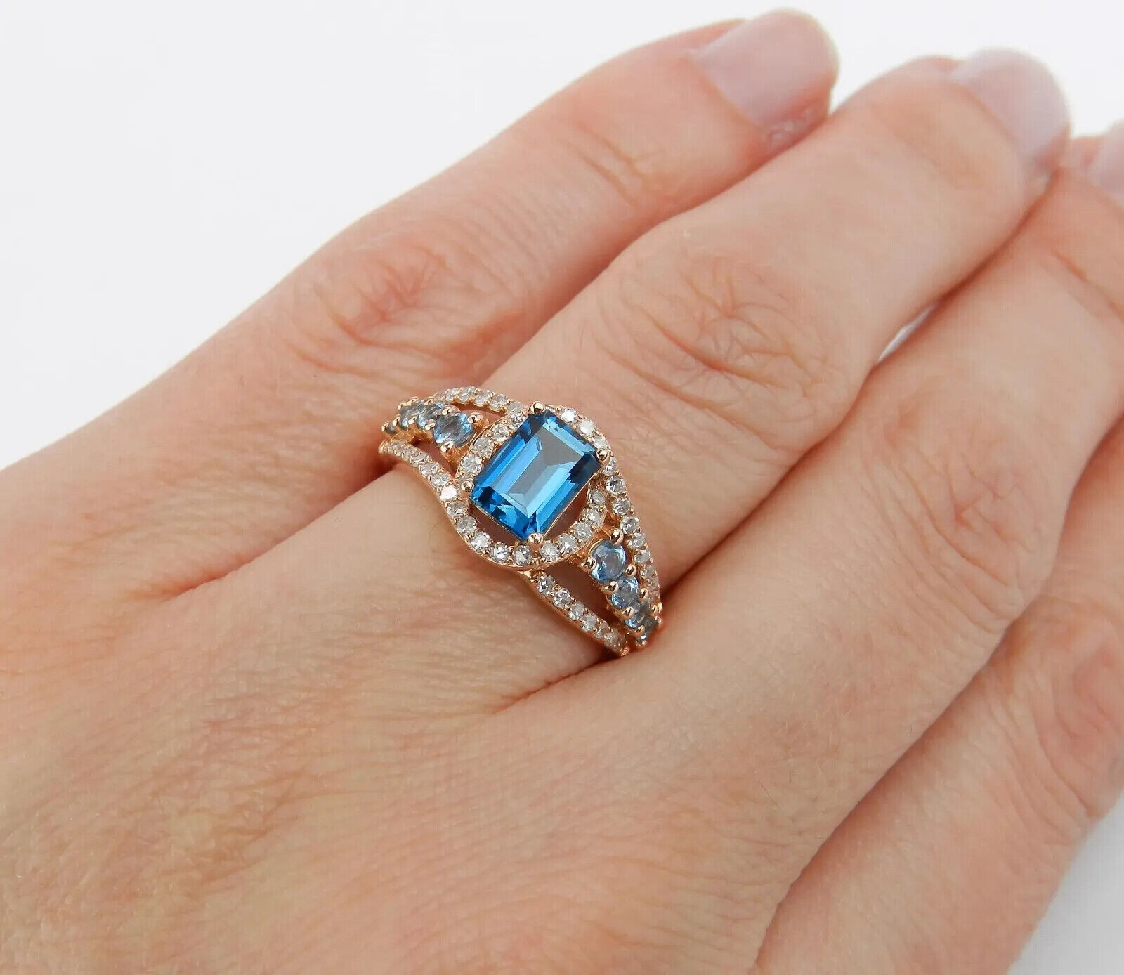 3Ct Emerald Cut Simulated Blue Diamond Women’s Ring 14k Rose Gold Plated Silver
