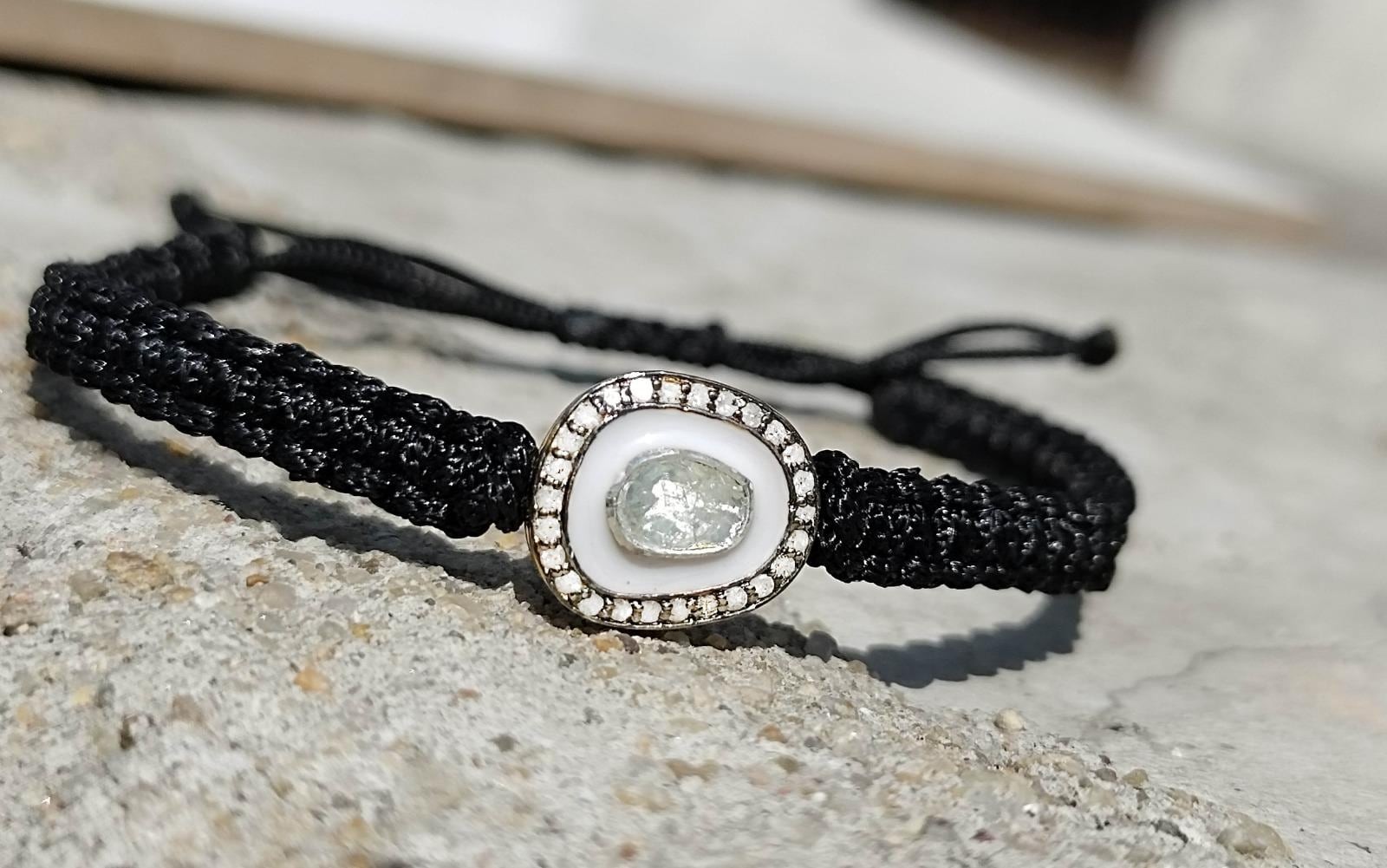 Natural Diamond White Enamel And Diamond Polki Adjustable Black Thread Bracelet.