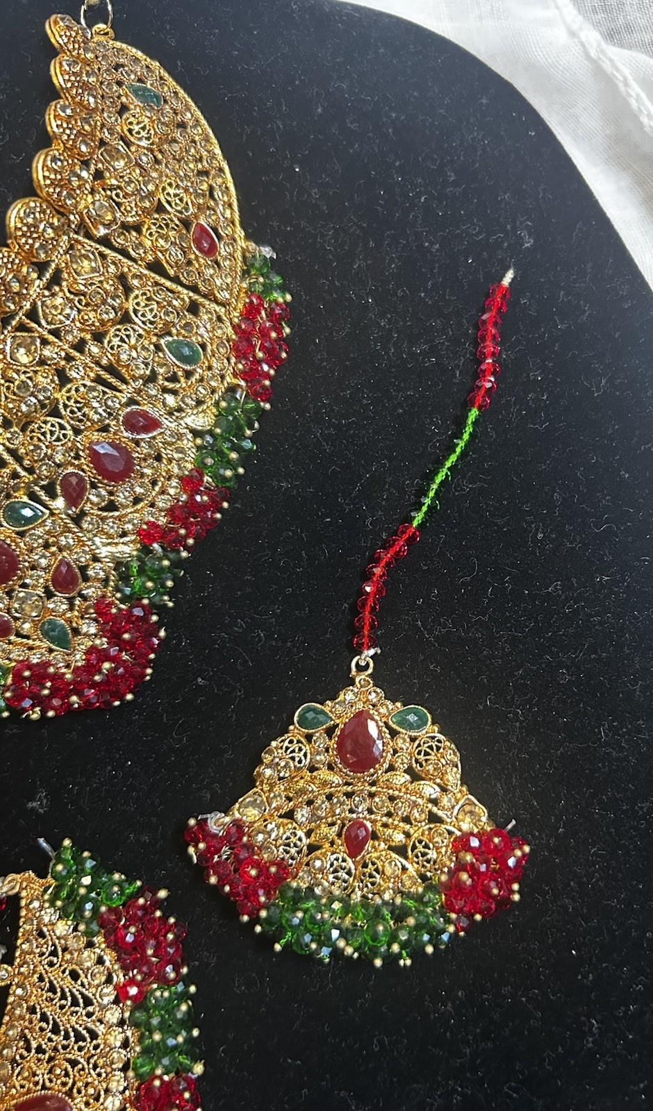 Gold Jewelry Set with Red and Green Details