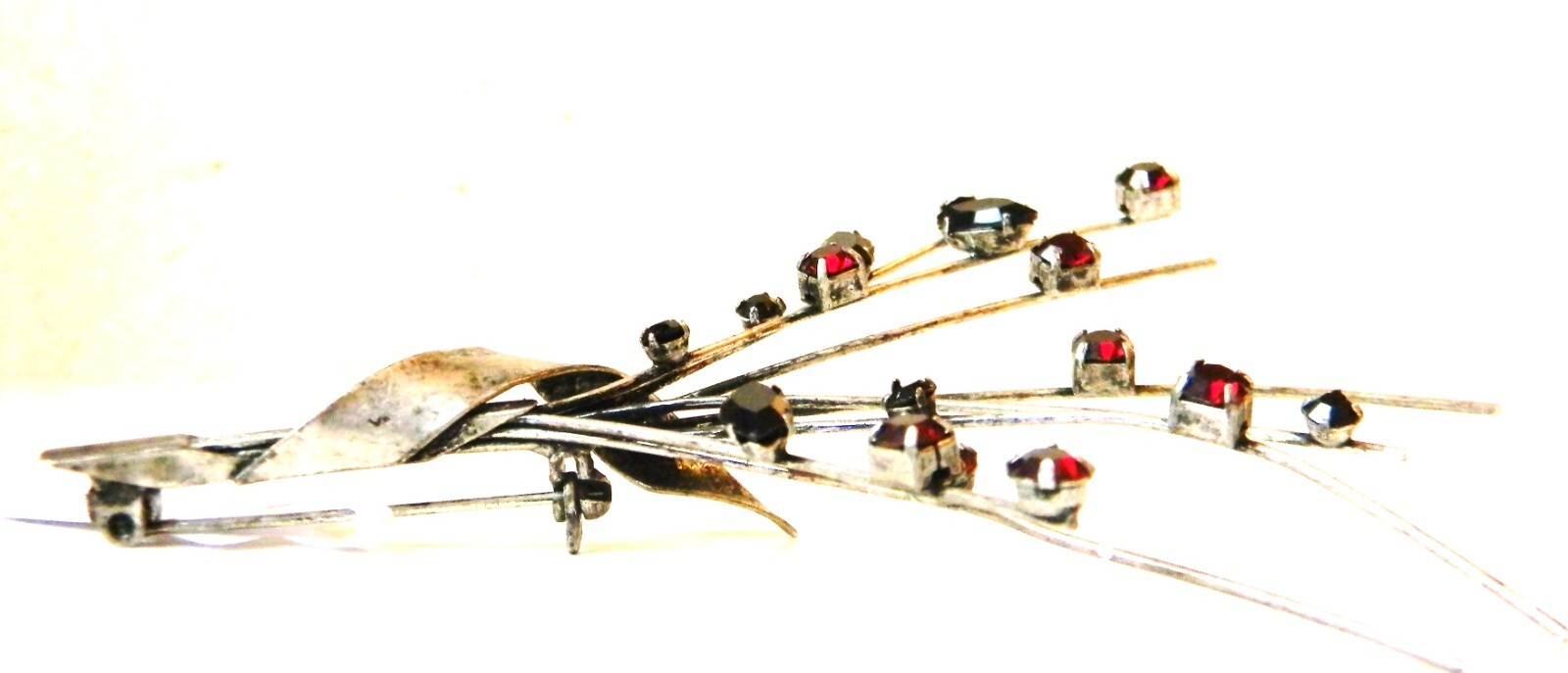 Brooch 2.5″ x 3.5″ Silver-Tone Floral Spray of Red Rhinestone Blooms ~46 no mark