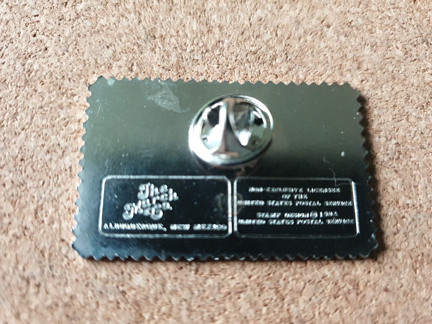 The March Co USPS 20c 1982 LOVE Stamp Floral Embossed Lapel Pin Back