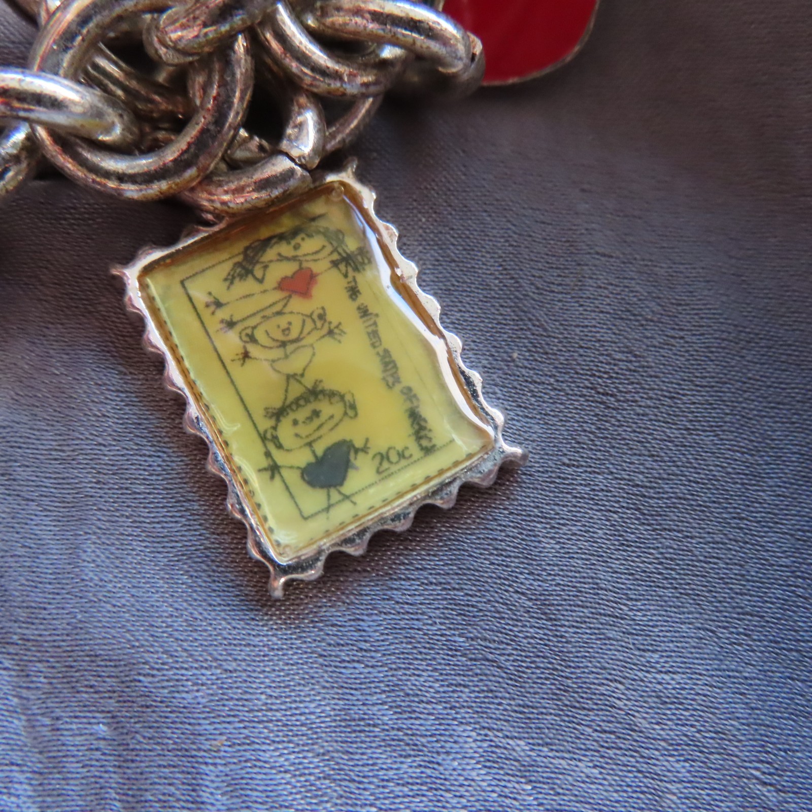 Education themed US Postal Stamp charm bracelet, silver-tone