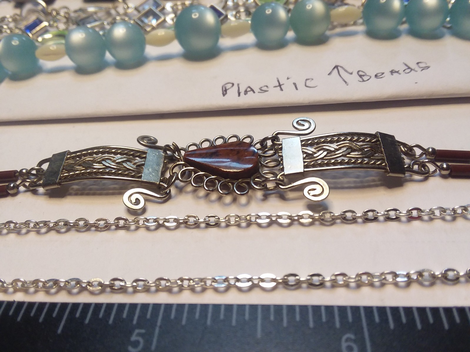 8 Bracelets: 3 Bracelets are Metal, 5 are Plastic 05-01-2026