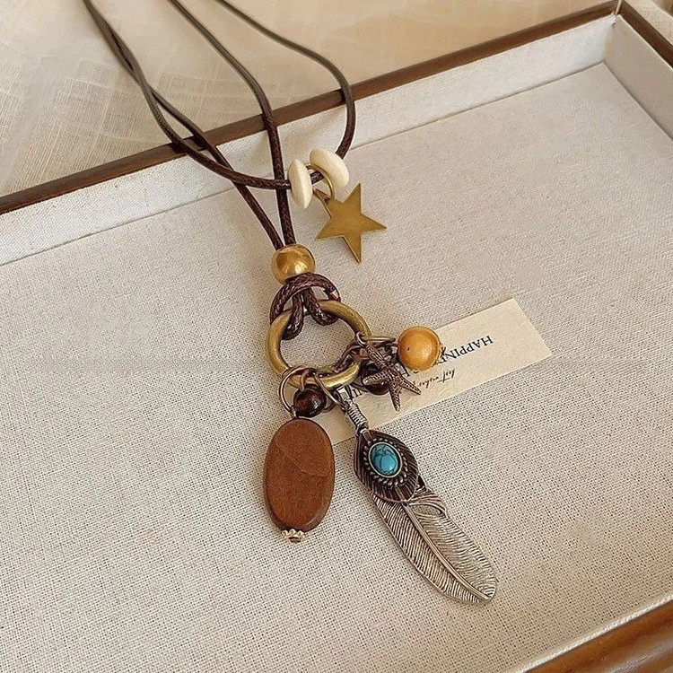 7Pcs Bohemian Women’s Necklace Set – Layered Cord Necklaces with Feather