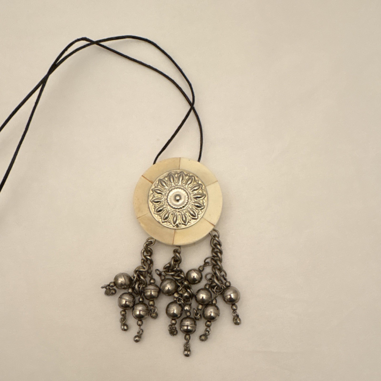 Vtg Round Cream & Silver Tone Charm Pendant Cord Necklace Silver Tone Dangles