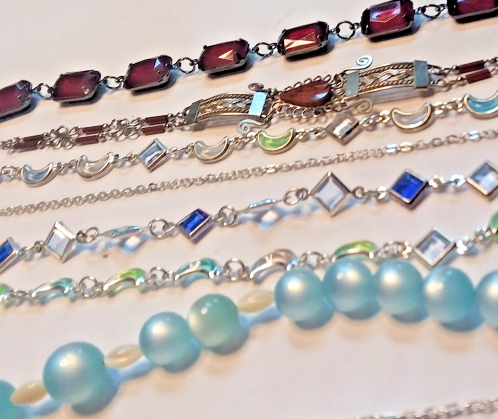 8 Bracelets: 3 Bracelets are Metal, 5 are Plastic 05-01-2026