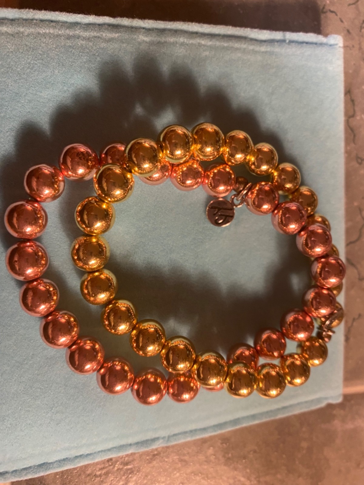 2 T jazelle bracelets pink and gold regular size