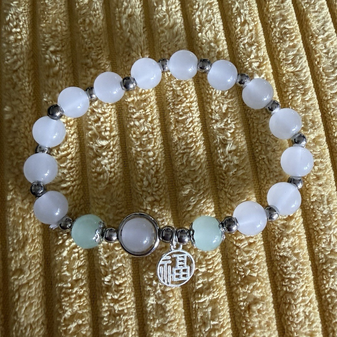White & Light Green Beaded Stretch Slip-On Bracelet with Silver Dangle Charm