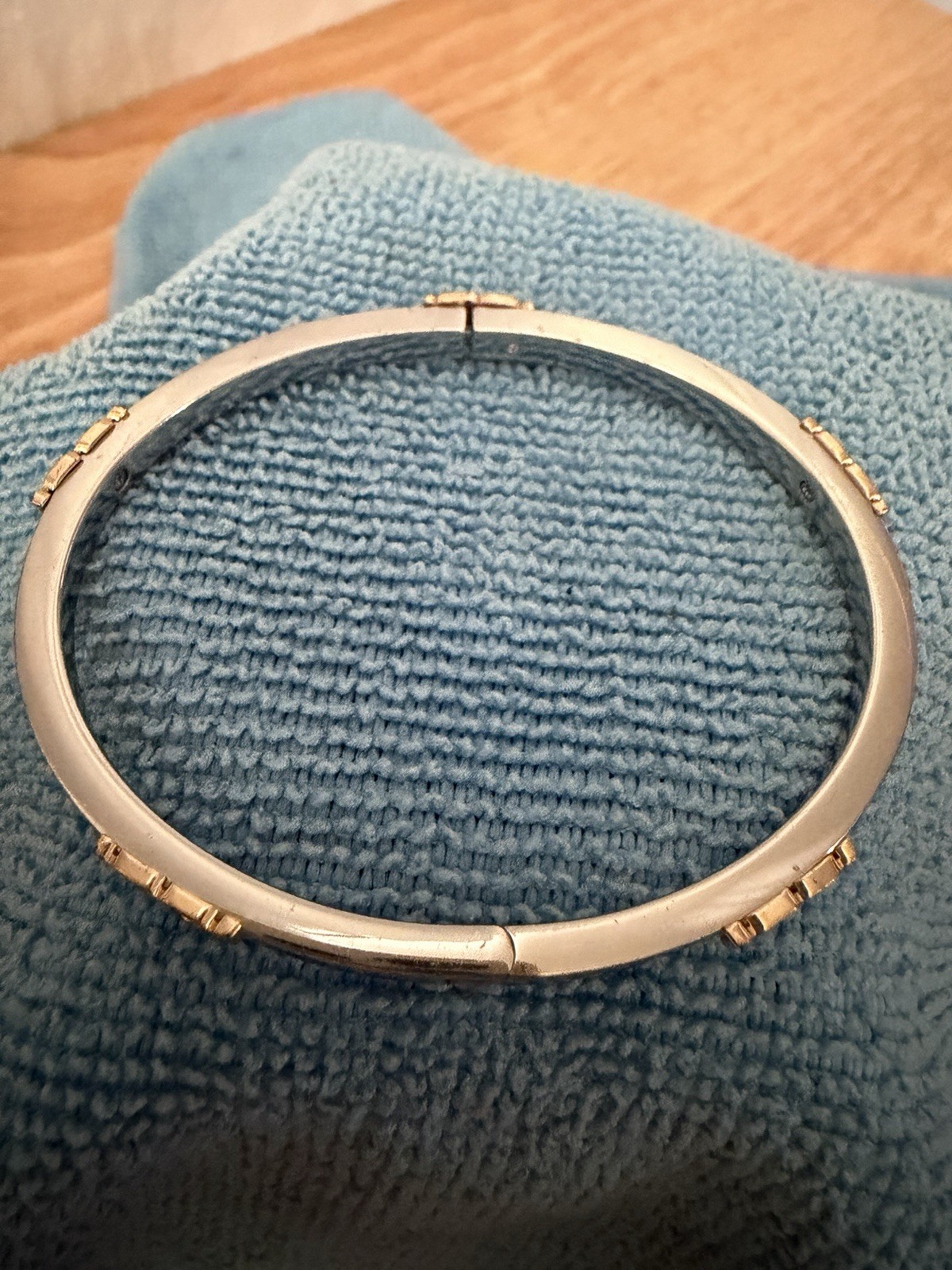 Silver Tone Metal Hinged Bangle Bracelet with Gold Tone Accents, No Stone